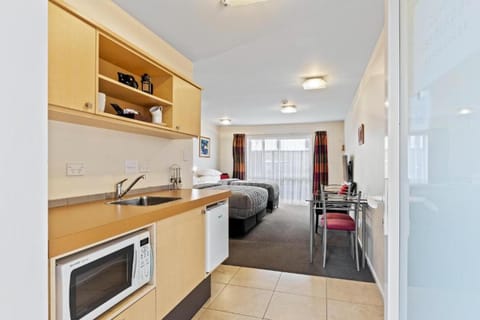 Twin Shower Studio | Private kitchen | Full-size fridge, microwave, electric kettle