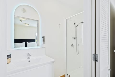 One-Bedroom Suite | Bathroom | Eco-friendly toiletries, hair dryer, towels, soap