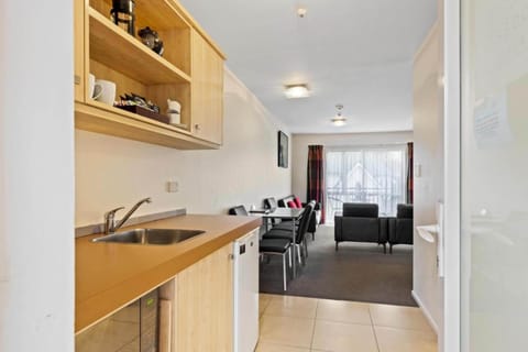 Two-Bedroom Suite | Private kitchen | Full-size fridge, microwave, electric kettle