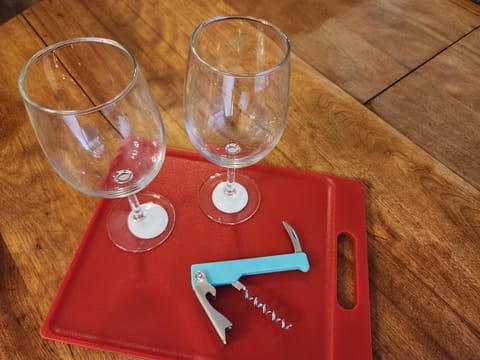 Ammie's kitchen is also stiocked with wine glasses and a bottle opener.