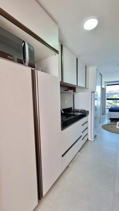 Superior Apartment, City View | Private kitchen | Fridge, microwave, stovetop, cookware/dishes/utensils