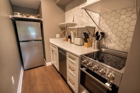 Enchanted Treehouse Hideaway's fully-equipped kitchen