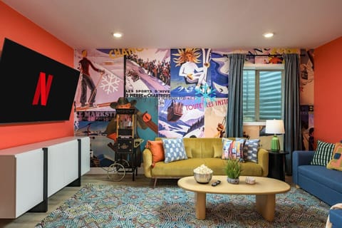 Living room w/ 70` smart television