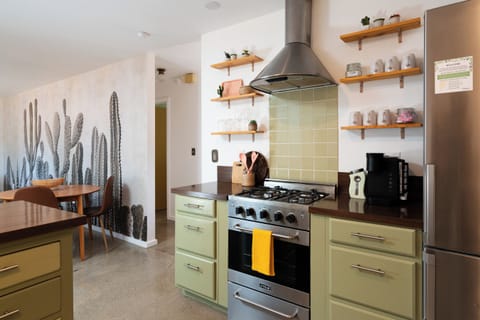 Enjoy high end appliances in the retro styled kitchen