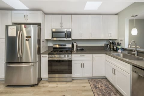 Gourmet Kitchen: Whip up culinary delights in this sleek, modern space with premium appliances!