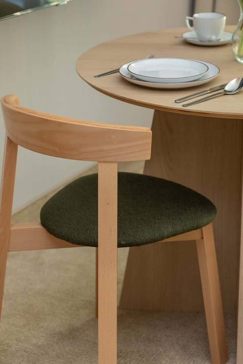 Dining area with minimalist design – Clean, modern, and functional.

