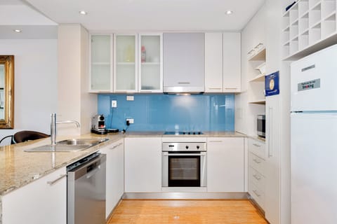 Two Bedroom Ocean View Apartment | Private kitchen | Full-size fridge, microwave, oven, stovetop