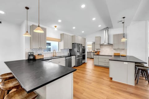 Modern and Sleek Kitchen: stocked with appliances and cookware