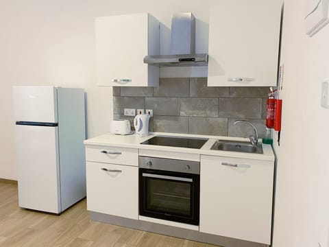 One Bedroom Apartment | Private kitchen | Fridge, oven, stovetop, electric kettle