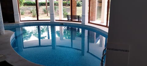 Indoor pool, sun loungers