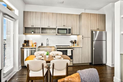 As you take your seat, the dining room's sophisticated design sets the stage for memorable meals and conversations.