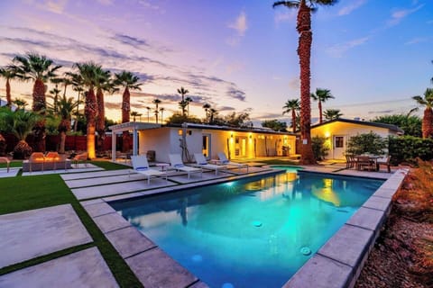 Bask in the beauty of this backyard oasis- perfect spot for evening relaxation