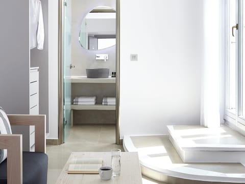 Suite, Hot Tub, Garden View (Elegant) | Bathroom | Shower, rainfall showerhead, free toiletries, hair dryer