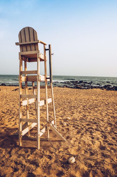 On the beach, sun loungers, beach umbrellas, beach towels