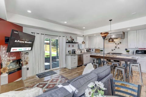 Unwind in this bright and stylish living area, where modern comforts meet cozy charm.