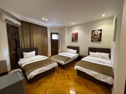 Comfort Triple Room | Select Comfort beds, minibar, laptop workspace, free WiFi