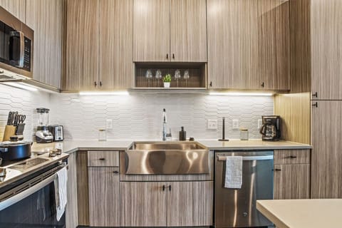 As you step into the kitchen, the clean lines and functional design make you eager to start cooking your favorite dishes.