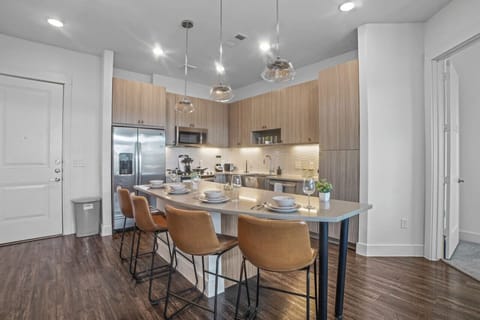 The dining room is bathed in natural light, creating a bright and inviting space where every meal feels special.