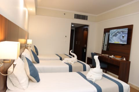 Basic Triple Room, City View | In-room safe, free WiFi