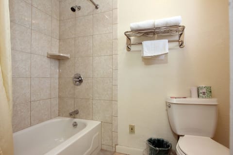 Standard Room, 1 King Bed | Bathroom | Combined shower/tub, hair dryer, towels