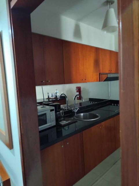 Deluxe Room, City View | Private kitchen | Mini-fridge, microwave, oven, stovetop