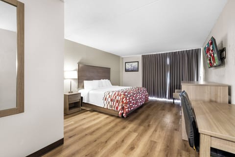 Desk, laptop workspace, blackout drapes, free cribs/infant beds