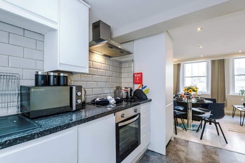 The fully equipped kitchen benefits from all the essentials for a short or long stay in Liverpool.