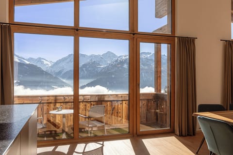 Penthouse mit 5 Schlafzimmer | Living area | Flat-screen TV