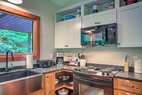 Kitchen is outfitted with an Electric Range