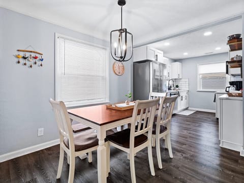 Dine in style—enjoy meals at our spacious and modern dining table.