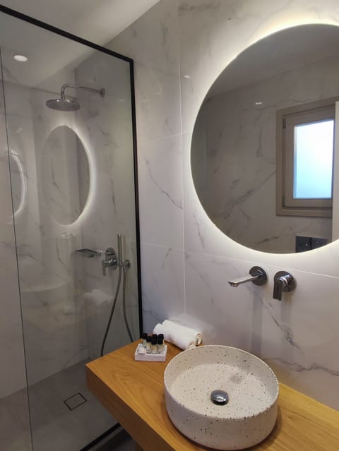 Double Room | Bathroom | Shower, hair dryer, towels, soap