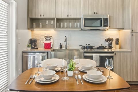 The spacious dining room invites you to savor every moment, whether enjoying a quiet meal or hosting a festive gathering.