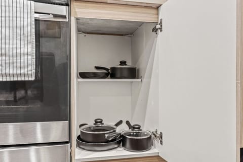 The kitchen invites you to experiment with new recipes, offering a stylish and practical space to cook and create.