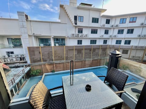 Exclusive Condo, 3 Bedrooms, Kitchen, Pool View | Terrace/patio