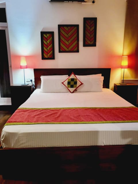 Deluxe Double Room, Balcony | In-room safe, desk, iron/ironing board, free WiFi