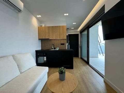 Deluxe Penthouse, Harbor View | Living area | Flat-screen TV