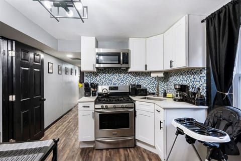 full kitchen - gas stove, 2 coffee makers, all cooking essentials, baby chair. full fridge, 4 person dining area, baby highchair