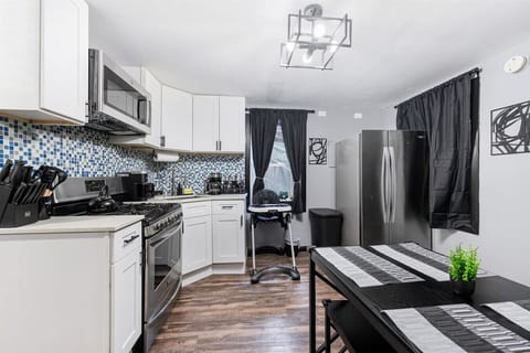 full kitchen - gas stove, 2 coffee makers, all cooking essentials, baby chair. full fridge, 4 person dining area, baby highchair