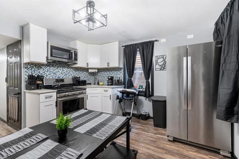 full kitchen - gas stove, 2 coffee makers, all cooking essentials, baby chair. full fridge, 4 person dining area, baby highchair