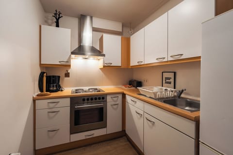 Comfort Apartment | Private kitchen | Fridge, microwave, oven, stovetop