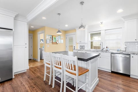 The chef's kitchen is a blast to cook and bake in, with ample space for guests to visit from the bar