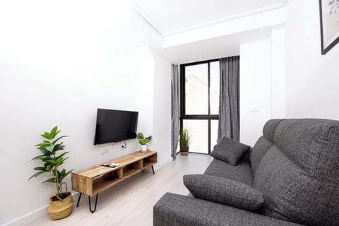 Family Apartment | Living area | Flat-screen TV