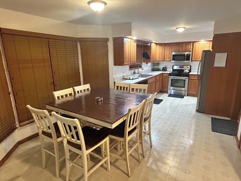 Dining area with big table for shared moments.