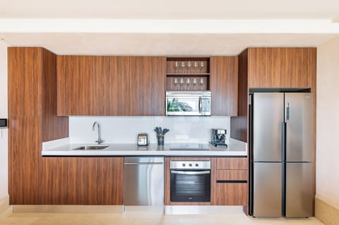 Deluxe Condo | Private kitchen | Full-size fridge, microwave, oven, stovetop