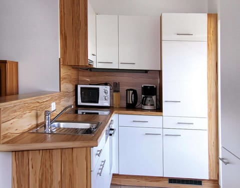 Apartment | Private kitchen | Electric kettle, toaster, highchair