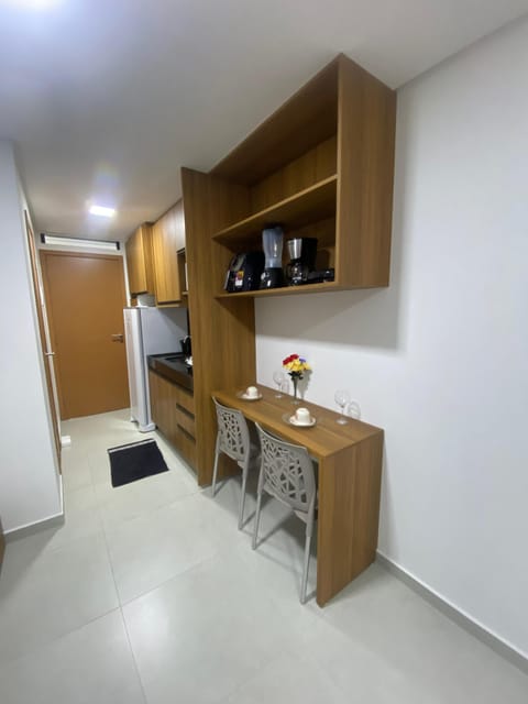 Classic Studio, City View | Living area | Flat-screen TV