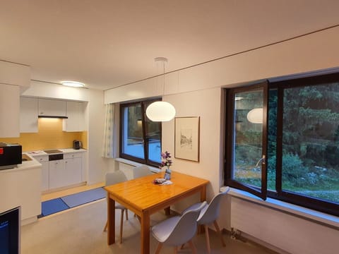 Property, Building, Table, Plant, Wood, Interior Design, Cabinetry, Desk, Houseplant, Window