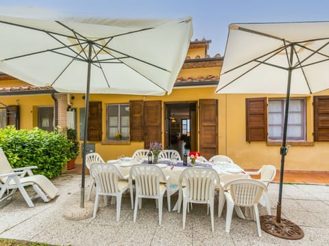 Table, Furniture, Property, Window, Plant, Umbrella, Chair, Shade, Outdoor Table, Sky
