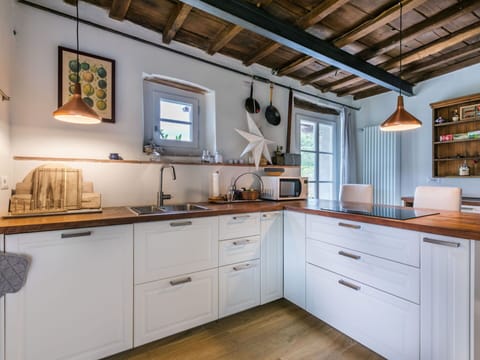 Interior Design, Kitchen, Cabinetry, Furniture, Countertop, Flooring, Wood, Ceiling, Home, Floor