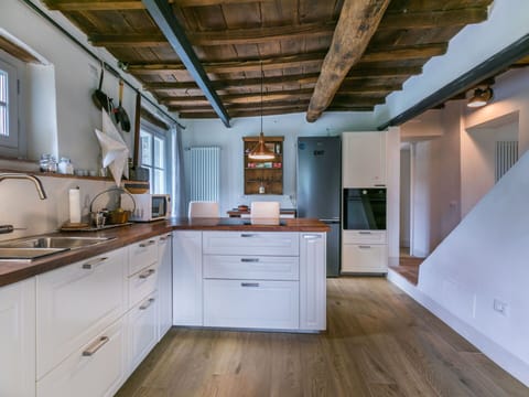 Countertop, Kitchen, Furniture, Flooring, Interior Design, Cabinetry, Wood, Floor, Ceiling, Kitchen Appliance